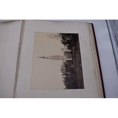 148 - PHOTOGRAPH ALBUMS: 2 folio albums, both worn with contents partially excised, numerous albumen ... 