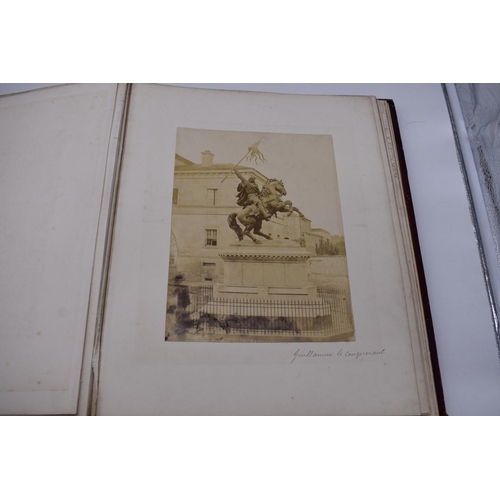 148 - PHOTOGRAPH ALBUMS: 2 folio albums, both worn with contents partially excised, numerous albumen ... 