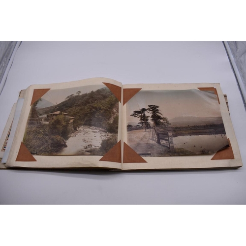 155 - PHOTOGRAPH ALBUM: JAPAN: varied album of approx 97 tinted albumen print views of Japan, circa 1900, ... 