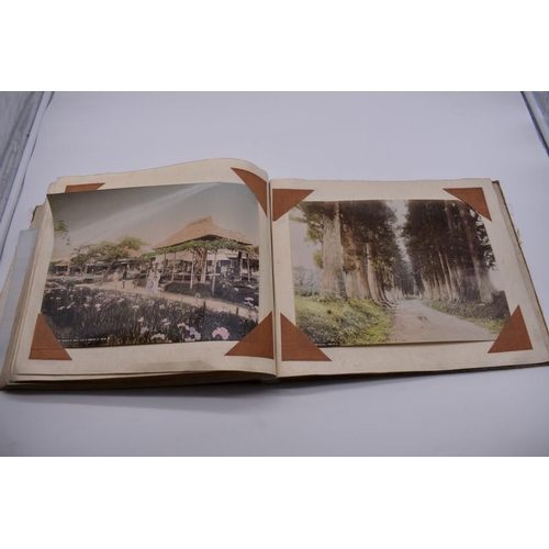 155 - PHOTOGRAPH ALBUM: JAPAN: varied album of approx 97 tinted albumen print views of Japan, circa 1900, ... 