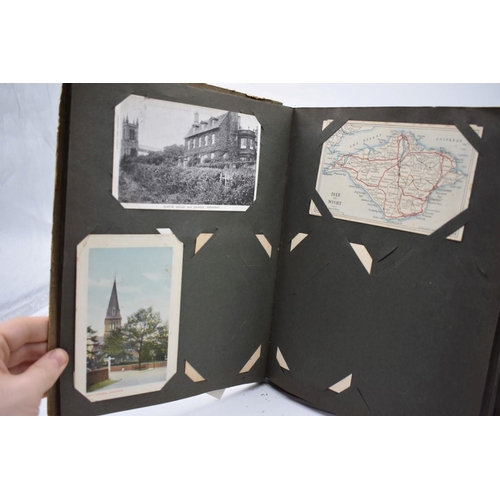 62 - POSTCARD ALBUM: inter-war period album containing approx 213 postcards, largely British topogra... 