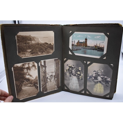 62 - POSTCARD ALBUM: inter-war period album containing approx 213 postcards, largely British topogra... 