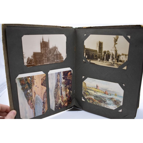 62 - POSTCARD ALBUM: inter-war period album containing approx 213 postcards, largely British topogra... 