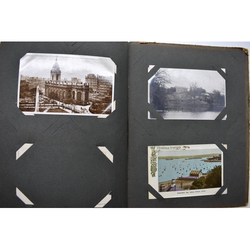 62 - POSTCARD ALBUM: inter-war period album containing approx 213 postcards, largely British topogra... 