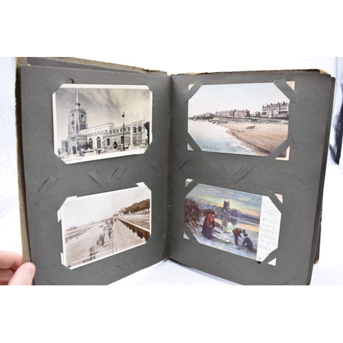 62 - POSTCARD ALBUM: inter-war period album containing approx 213 postcards, largely British topogra... 