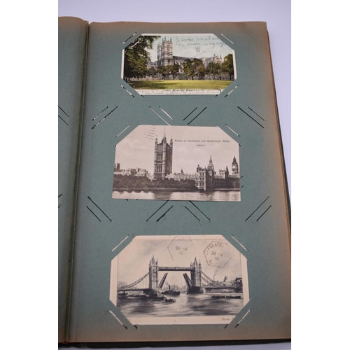 63 - POSTCARD ALBUM: LONDON: large earlier 20thc album containing approx 150 postcards, largely earl... 