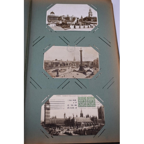 63 - POSTCARD ALBUM: LONDON: large earlier 20thc album containing approx 150 postcards, largely earl... 