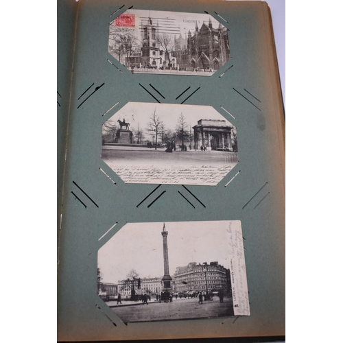 63 - POSTCARD ALBUM: LONDON: large earlier 20thc album containing approx 150 postcards, largely earl... 