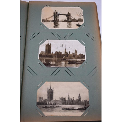 63 - POSTCARD ALBUM: LONDON: large earlier 20thc album containing approx 150 postcards, largely earl... 