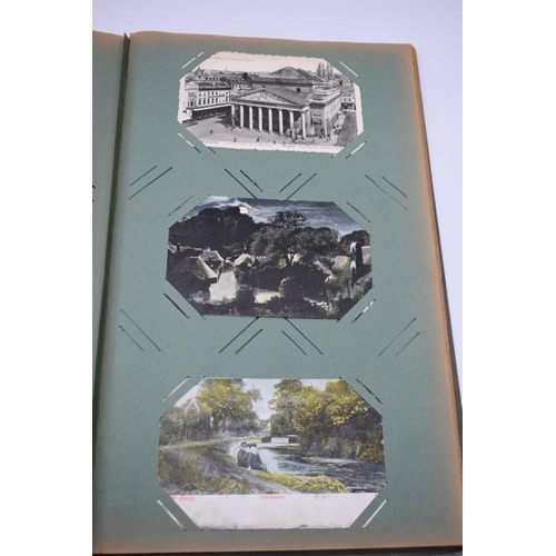 63 - POSTCARD ALBUM: LONDON: large earlier 20thc album containing approx 150 postcards, largely earl... 