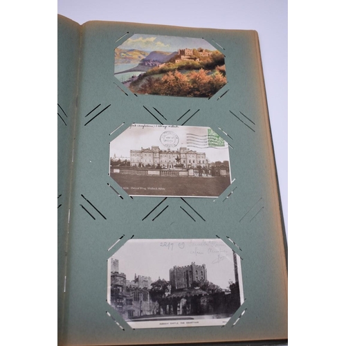 63 - POSTCARD ALBUM: LONDON: large earlier 20thc album containing approx 150 postcards, largely earl... 