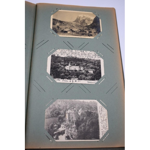 63 - POSTCARD ALBUM: LONDON: large earlier 20thc album containing approx 150 postcards, largely earl... 