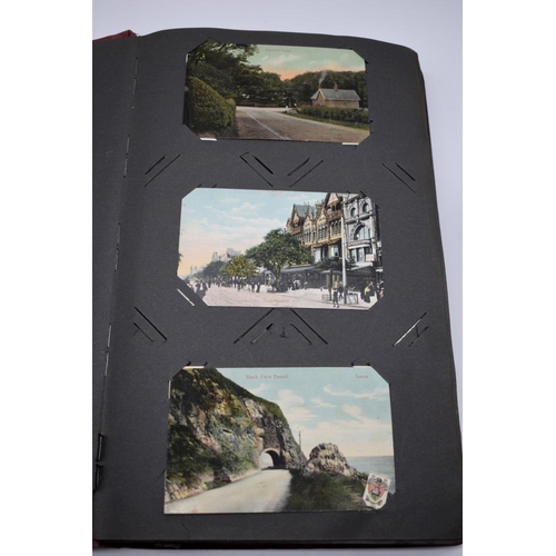 64 - POSTCARD ALBUM: contains approx 296 mixed postcards, topographical and greetings, generally in ... 