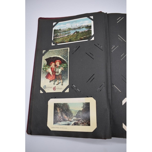 64 - POSTCARD ALBUM: contains approx 296 mixed postcards, topographical and greetings, generally in ... 