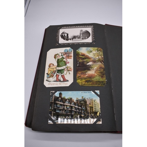 64 - POSTCARD ALBUM: contains approx 296 mixed postcards, topographical and greetings, generally in ... 