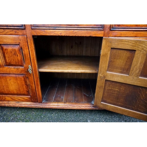 1040 - A reproduction oak dresser having rack back, 157cm wide x 52cm deep x 186cm high.Payment must be mad... 