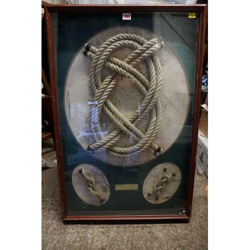 1062 - A reproduction framed knot display, 91 x 60cm.Payment must be made in advance of collection which is... 