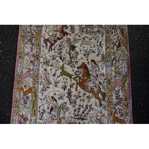 1076 - A Persian rug, having central field decorated with animals and figures, 148 x 100cm.... 