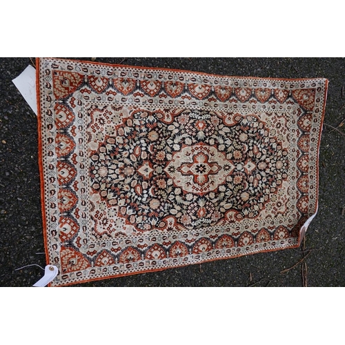 1086 - A Persian rug, having repeated design to central field with geometric borders on a red ground, 202 x... 