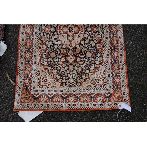 1086 - A Persian rug, having repeated design to central field with geometric borders on a red ground, 202 x... 