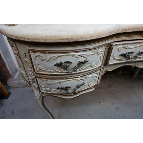 1111 - A Louis XV style grey painted and parcel gilt mirror back dressing table, with marble top and cane d... 