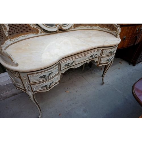 1111 - A Louis XV style grey painted and parcel gilt mirror back dressing table, with marble top and cane d... 