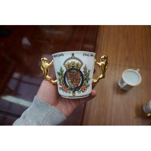 1120 - A small group of pottery and porcelain, to include: Paragon royal commemorative loving cups; and Hal... 