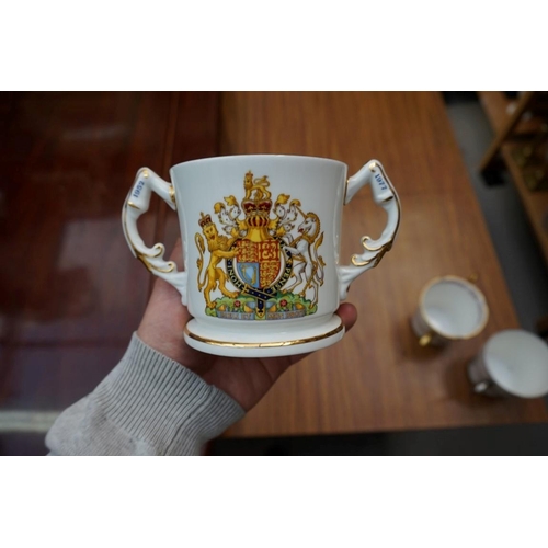 1120 - A small group of pottery and porcelain, to include: Paragon royal commemorative loving cups; and Hal... 