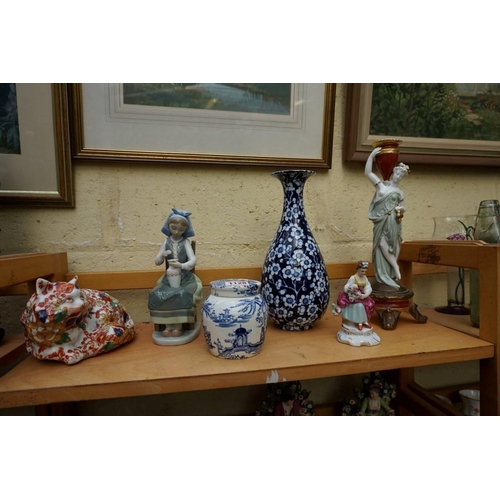 1128 - A small group of pottery and porcelain, to include: a Lladro figure, 21cm high, (chip to little fing... 