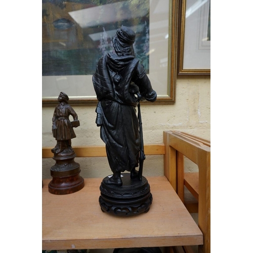 1132 - A small collection of spelter and other patinated metal figures, largest 33cm high.