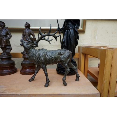 1132 - A small collection of spelter and other patinated metal figures, largest 33cm high.