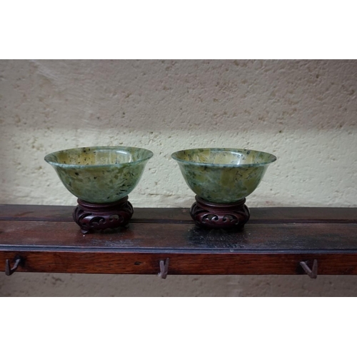 1134 - A mixed group of Chinese ceramics and works of art, to include: a pair of green jade bowls, 10cm dia... 