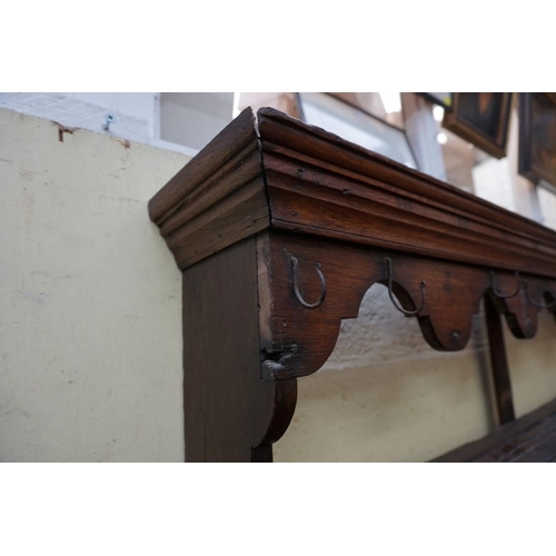 1136 - A late 18th/early 19th century oak potboard dresser and rack, 145cm wide. ... 