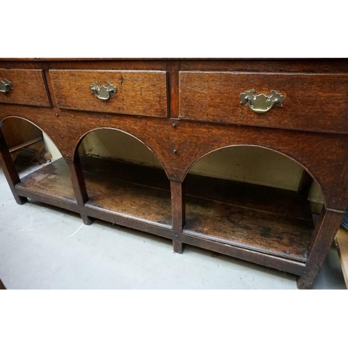 1136 - A late 18th/early 19th century oak potboard dresser and rack, 145cm wide. ... 