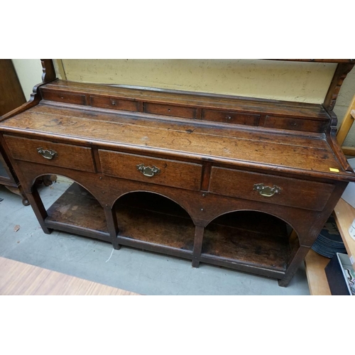 1136 - A late 18th/early 19th century oak potboard dresser and rack, 145cm wide. ... 