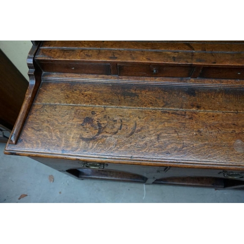 1136 - A late 18th/early 19th century oak potboard dresser and rack, 145cm wide. ... 