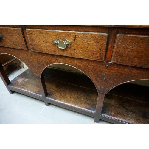 1136 - A late 18th/early 19th century oak potboard dresser and rack, 145cm wide. ... 