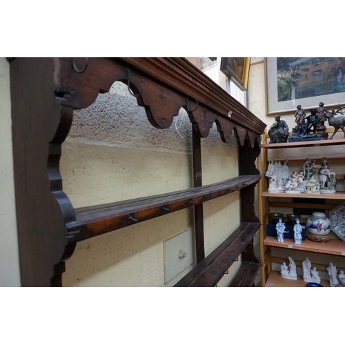 1136 - A late 18th/early 19th century oak potboard dresser and rack, 145cm wide. ... 