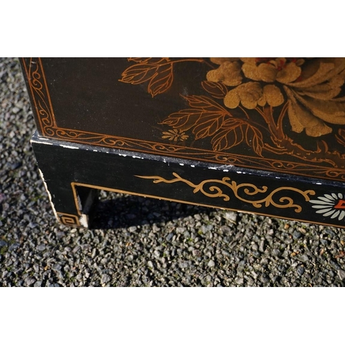 1155 - A small pair of Chinese black lacquered and gilt chests on stands, 61cm wide.