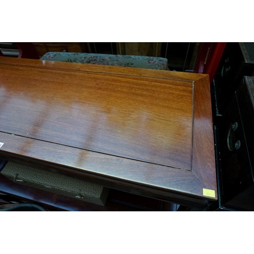 1156 - A Chinese hardwood rectangular low occasional table, 132cm wide. 