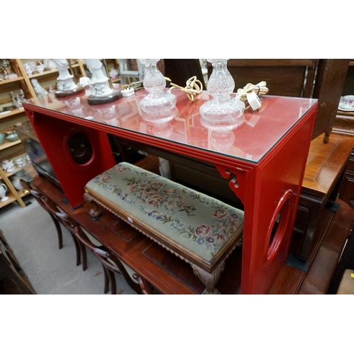 1163 - A Chinese red lacquered alter type table, 72 cm high x 127cm wide. 