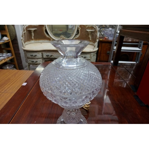 1165 - A pair of Waterford cut glass table lamps and shades, 35cm high, (chip to top rim of one).... 