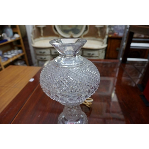 1165 - A pair of Waterford cut glass table lamps and shades, 35cm high, (chip to top rim of one).... 