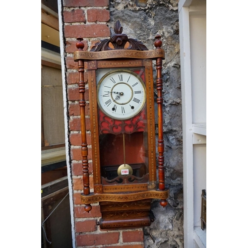 1181 - An American walnut and inlaid wall clock, 93cm high, (with associated battery operated movement).... 