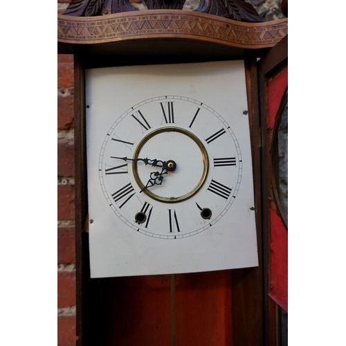 1181 - An American walnut and inlaid wall clock, 93cm high, (with associated battery operated movement).... 