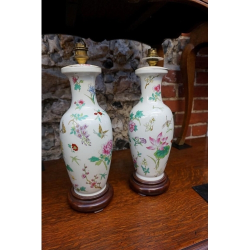 1186 - A pair of modern Chinese famille rose vase form table lamps, total height 39.5cm. ... 