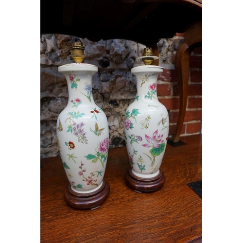 1186 - A pair of modern Chinese famille rose vase form table lamps, total height 39.5cm. ... 