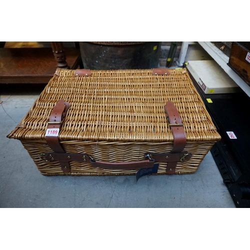 1189 - A Brookes four person wicker picnic hamper. 