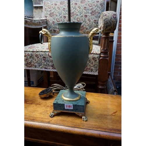 1191 - A green painted metal and parcel gilt table lamp, on marble base, total height 71cm.  ... 