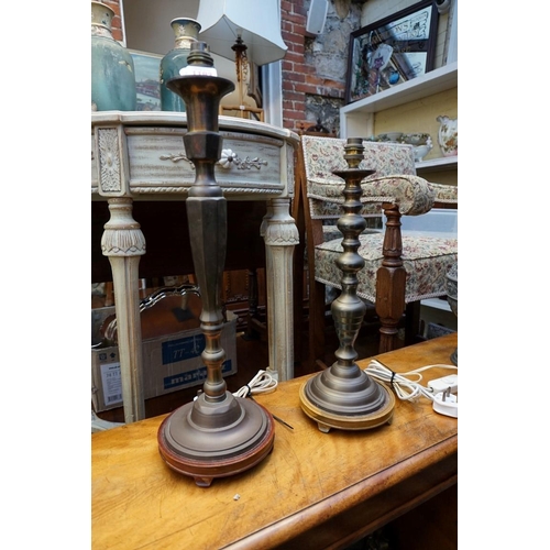 1193 - Two brass table lamps, largest 56cm high. 